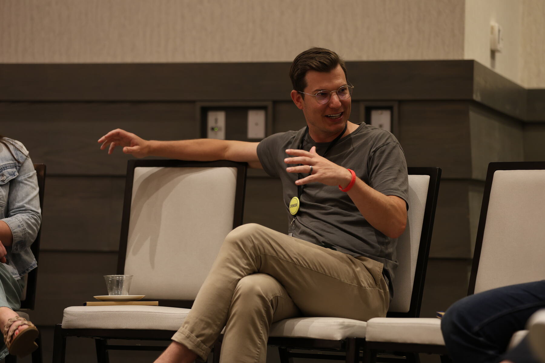 A panelist laughing during a session