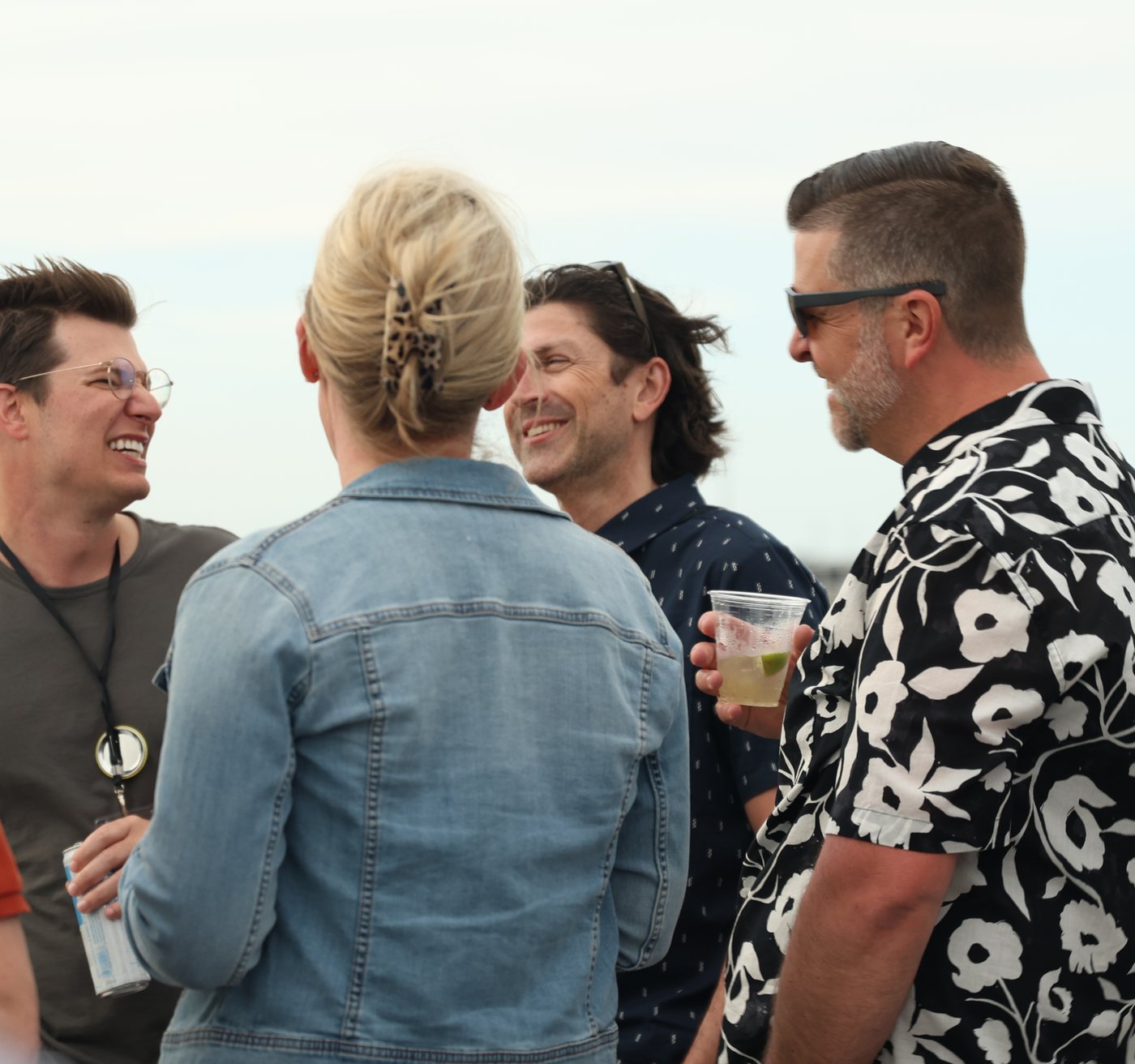 Agency owners laughing together on a boat at a past Agency Builders Retreat